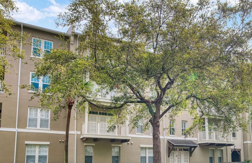 Welcome to effortless living in the sought-after Artisan Park village of Celebration. This beautifully renovated 2-bedroom, 2-bath condominium is truly move-in ready, offering a bright and airy layout designed for comfort and style. Luxury vinyl plank flooring enhances the main living area, while brand new carpet adds warmth and comfort to the bedrooms. Fresh interior paint and high-quality window treatments complete the polished feel of this inviting residence. Park in your private garage (freshly painted) and take the elevator up to your unit, making everyday living easy and secure. The open living and dining areas are filled with natural light and extend to a private balcony, the perfect place to relax with your morning coffee or unwind in the evening. The thoughtfully designed kitchen features top-of-the-line LG SMART appliances. The condo also includes a new LG washer and dryer that you can control directly from your phone. This home is offered furnished, including a king bedroom set, dining table, desk with bookcase and glass curio cabinet—allowing you to settle in immediately or easily prepare the home as a turnkey investment or seasonal retreat. A dedicated storage locker provides the perfect place to store seasonal decorations and bulky items. An ADT security system and Ring doorbell provide additional security. The building itself also benefited from extensive exterior improvements in 2025, ensuring a beautifully refreshed appearance and long-term durability. Just a block away, the exclusive Artisan Park Clubhouse—available only to Artisan Park residents—offers an exceptional lifestyle with a state-of-the-art fitness center, resort-style pool and jacuzzi, and an on-site bar and grill where neighbors gather to enjoy great food and a sense of community. Experience the meticulous charm and resort-style amenities that make Artisan Park one of Celebration’s most desirable places to call home.