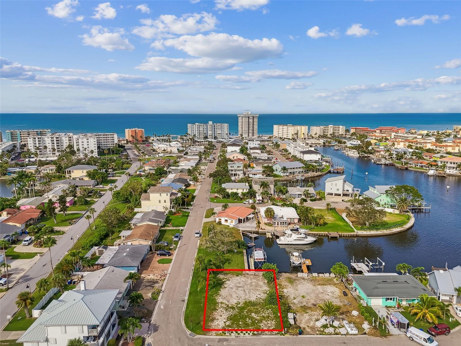 Discover the perfect lot where you can build your waterfront dream home! Located on a quiet cul-de-sac with no through traffic ensures your peace and quiet. This lot is zoned RS-7, which means the minimum rental period is six months. This property is a boater's dream with its newer composite dock and 13,000lb boat lift, offering easy access to the Intracoastal Waterway. Set sail for adventure or simply enjoy serene sunsets on the water – the choice is yours. The owner has complete builders plans for a 1,749 square foot, 3 bedroom, 2 bath home that will come with the purchase of the lot. Experience the coastal lifestyle you've always dreamed of in Redington Shores, FL. Your piece of paradise awaits!