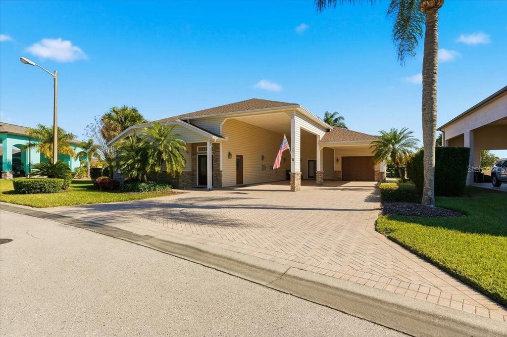 Photo of 451 Motorcoach Drive S, Polk City, FL 33868 (MLS # L4958889)