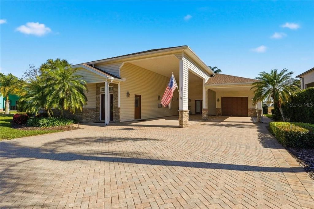 Photo of 451 Motorcoach Drive S, Polk City, FL 33868 (MLS # L4958889)