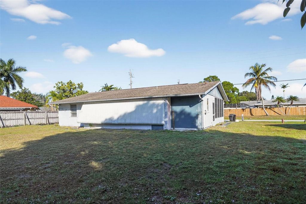 Photo of 310 SE Calmoso Drive, Port Saint Lucie, FL 34983 (MLS # O6375358)