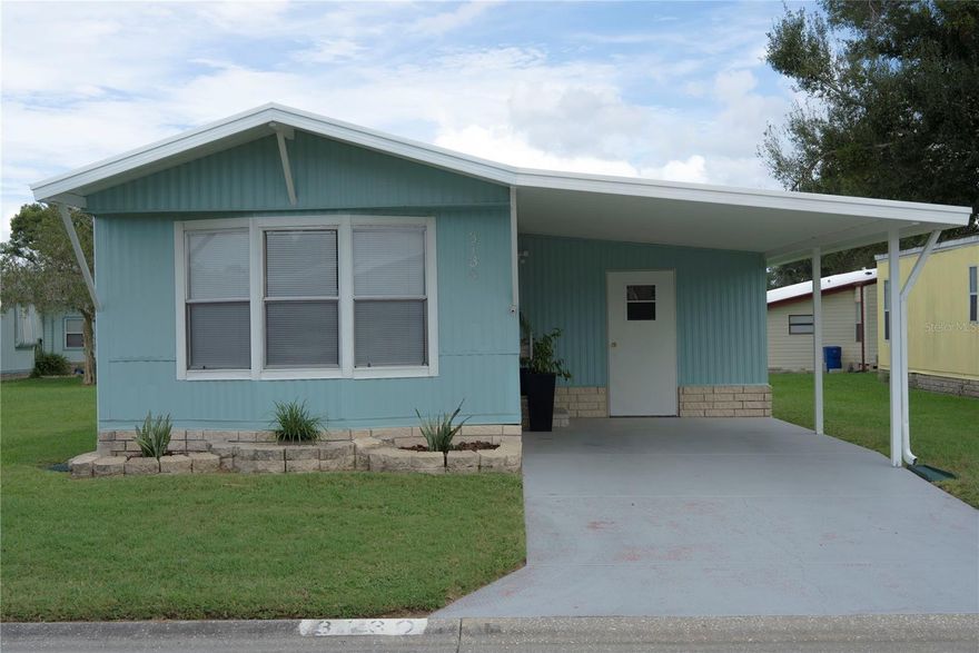 Beautifully remodeled one bed, one bath home (optionally furnished) in the private community of Timber Lake Estates in Wesley Chapel, a northeast suburb of Tampa. Your purchase of this home includes the land (no lot rental). As you enter, you'll notice the open feel of the living, dining and kitchen areas. The kitchen features stainless steel appliances, pantry and breakfast bar and a convenient built-in desk. The attached bonus room includes a laundry closet, additional storage and a nice sitting area. All appliances are included: Refrigerator, Range, Microwave, Washer & Dryer. A/C replaced in 2020, Roof in 2022. Your low monthly HOA fee of $196 provides for Water, Sewer, Trash and Basic Lawn Care. This community is well-maintained and offers these AMMENITIES: 2 Clubhouses, 2 Pools, Hot Tub, Playground, Basketball Court and Shuffleboard. RV/Boat parking available at an additional nominal fee. LOCATION: Publix (5 mins), Walmart (15 mins), USF (25 mins), The Shops at Wiregrass (13 mins), Tampa International Airport (60 mins), Downtown Tampa (40 mins), and close to all the restaurants, shopping and entertainment for which the Tampa Bay area is famous. Schedule your showing today!