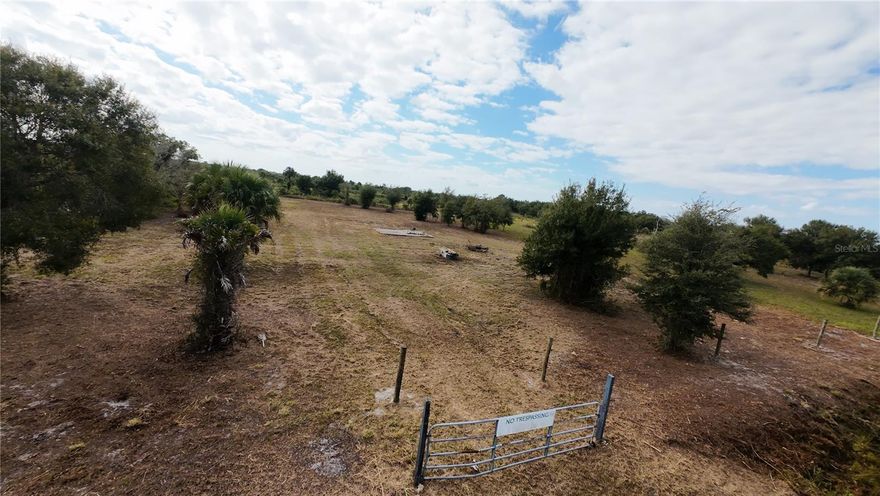 1.25-acre High & Dry lot located on desirable Viking Estates/Prairie area of Okeechobee. This property is fully prepared and ready for your new home;  Well, septic, main gate, culvert, and ongoing perimeter fencing included. The lot has been cleared, leveled, and maintained, offering a clean canvas for you. This property checks all the boxes, built on your terms; no flood zone (X) for complete peace of mind.  A-1 Agriculture/Residential, Zoned, this parcel allows site-built homes, manufactured homes, animals, barns, workshops, and small-scale farming. It offers a perfect lifestyle for those seeking space, privacy, and freedom with NO HOA and low annual taxes. Power poles are located very close to the street for easy electrical connection. Situated just minutes from the Kissimmee Prairie Preserve State Park, one of Florida’s largest natural preserves, enjoy endless outdoor recreation, including riding trails, wildlife viewing, fishing, and hunting. This fast-growing rural community continues to see strong demand—especially for improved, build-ready lots like this one. Whether you're planning a primary residence, weekend retreat, barndominium, or long-term land investment,  with zoning that allows single-family homes or mobile/manufactured homes over 1,000 sq. ft. (buyer to verify), giving you the flexibility to design the property your way. Conveniently located near major cities—20 min to Okeechobee, 40 min to Fort Pierce and Port St. Lucie, 1.5 hours to West Palm Beach, 2 hours to Orlando, and roughly 2.5 hours to Miami—this area offers both privacy and accessibility. Enjoy the freedom to ride ATVs, start a small farm with animals and gardens, or simply relax in a peaceful rural setting. This is genuine Florida country living: plenty of space, total flexibility, and the freedom to live exactly how you choose.