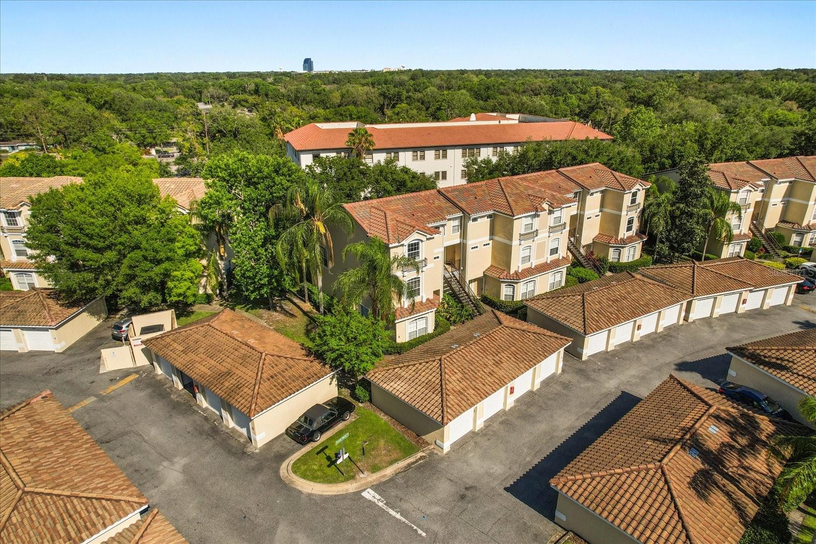 Available for immediate move in. Mediterranean-Style FIRST FLOOR Condo with PRIVATE GARAGE in Prime Location. Step into effortless living in this beautifully maintained 3-bedroom, 2-bathroom first-floor condo with resort-like amenities. This 1,230 square feet of well-designed layout includes a formal living room, dining area, and a separate family room, perfect for entertaining or relaxing. The interior features all-tile flooring—NO CARPET anywhere—for easy upkeep and a clean, contemporary feel. The kitchen shines with GRANITE countertops and STAINLESS STEEL appliances, while the interior laundry room comes equipped with a washer and dryer. Retreat to the spacious primary suite, complete with a double-sink vanity in the ensuite bath and a two walk-in closets. Enjoy peaceful mornings and evenings on the screened-in porch, perfect for savoring Florida’s year-round sunshine. Residents of Key West Condos enjoy access to a resort style pool and fitness center. Zoned for top-rated A+ elementary schools and located just minutes from Target, Publix, Walmart, Lowe’s, Home Depot, Whole Foods, and the Altamonte Mall—with easy access to I-4, 434, 436, and 414—this location is as convenient as it is central. Available for immediate move in. Easy to see. Call/text for your private showing today!