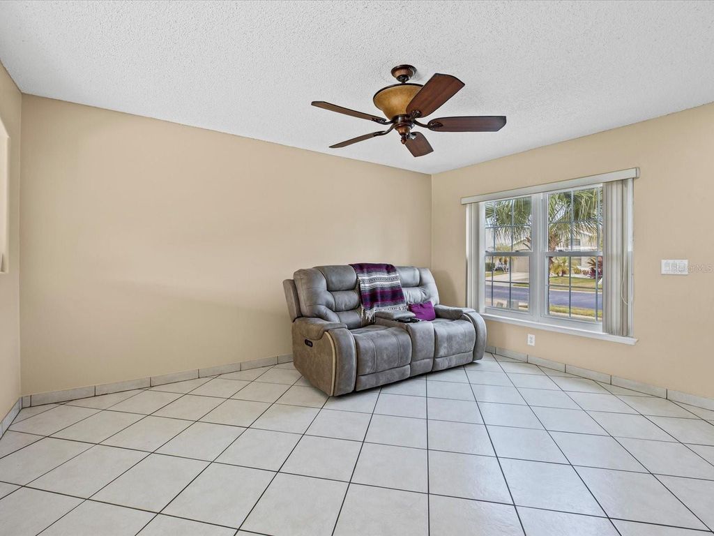 Photo of 1220 Heather Lake Drive, Orlando, FL 32824 (MLS # O6370998)