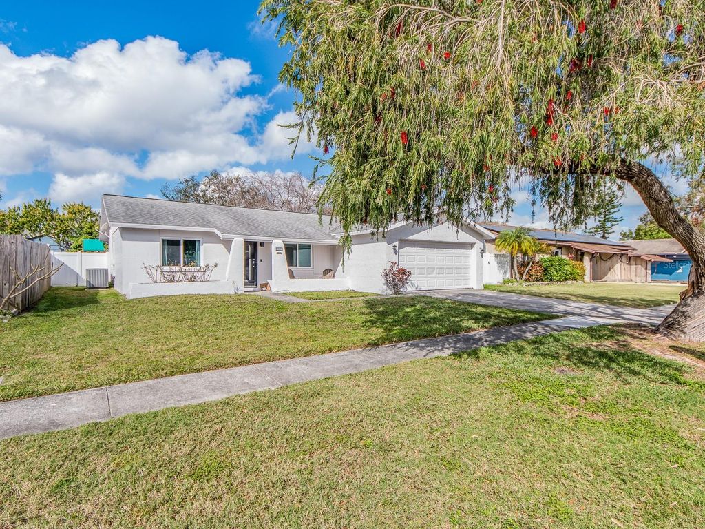 Photo of 12410 Cumberland Drive, Largo, FL 33773 (MLS # TB8479127)