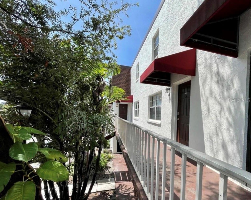 Photo of 9209 Tudor Drive #C203, Tampa, FL 33615 (MLS # TB8552835)