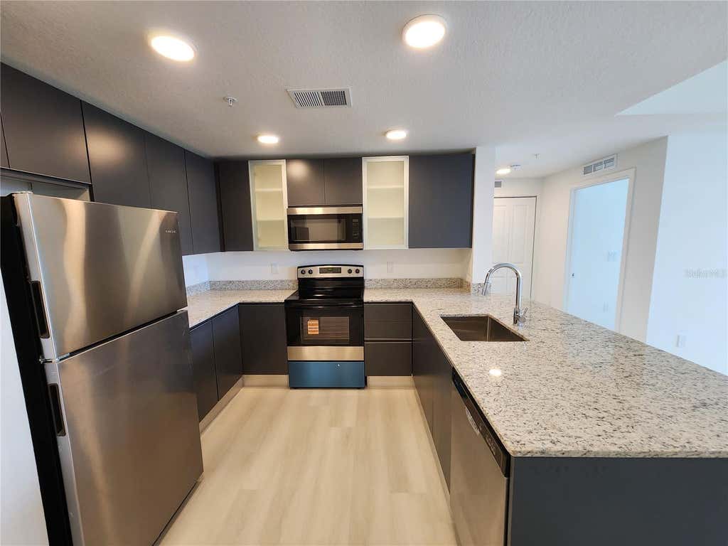 Photo of 5563 Milenia Park Boulevard #221, Orlando, FL 32839 (MLS # O6425948)
