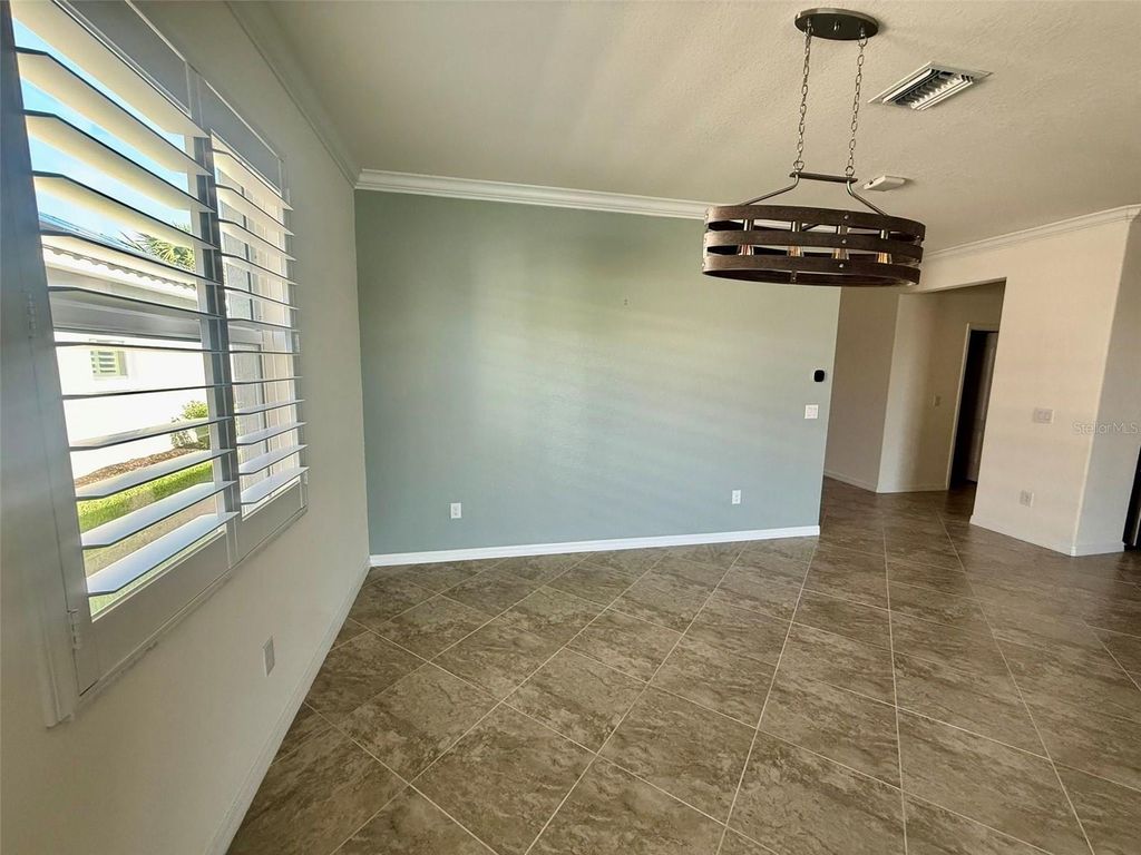 Photo of 15153 Spanish Point Drive, Port Charlotte, FL 33981 (MLS # C7524226)