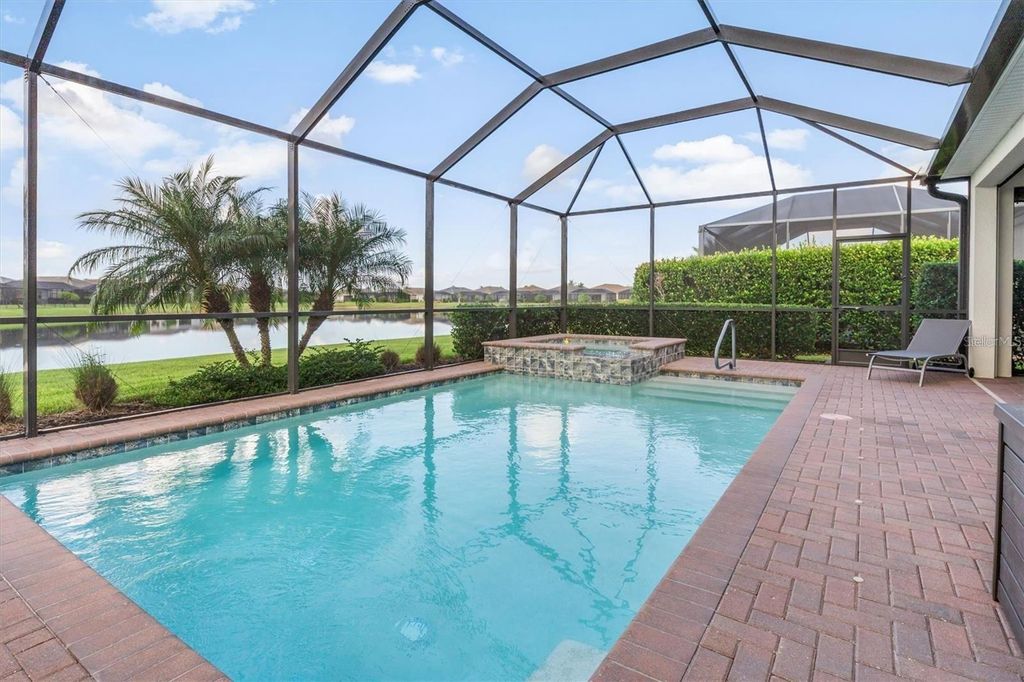 Photo of 15153 Spanish Point Drive, Port Charlotte, FL 33981 (MLS # C7524226)