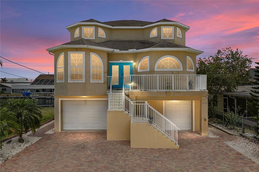 Step into the Florida lifestyle with this 4-bedroom, 3-bath waterfront retreat in the heart of Hernando Beach! With three levels and a private elevator and pool this home blends comfort and adventure. The first floor offers an open floor plan with a kitchen/dining room combo, master bedroom and private laundry room. Three spacious bedrooms, (two with private balconies overlooking the canal) are featured on the second floor, with views of the canal perfect, for quiet mornings or winding down at sunset. The top floor boasts a large rooftop deck with panoramic Gulf views, ideal for evening gatherings or simply soaking in the scenery. Outside, enjoy a heated, screened-in pool and your own private dock with boat lift—providing direct access to open water. Whether you're heading out to fish, cruise, or explore, this property delivers the ultimate boat life experience. Bring your sense of adventure & water toys! This home is minutes away from Weeki Wachee, Pine Island & Rogers Park and under an hour from the Homosassa Wildlife State Park. Call Today for your private showing!