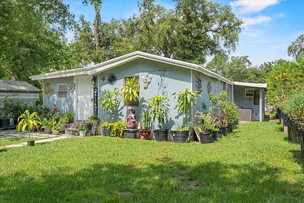Photo of 306 Avenue A Wahneta E, Winter Haven, FL 33880 (MLS # TB8551383)