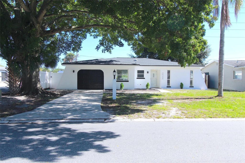 Photo of 30205 69th Street N, Clearwater, FL 33761 (MLS # TB8561874)