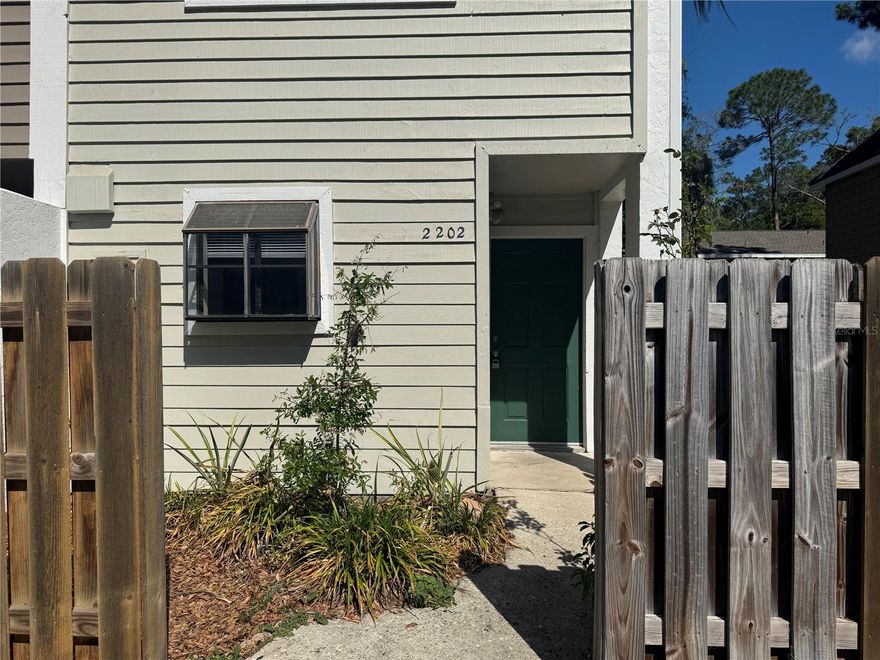 Beautiful end unit townhome in Mill Run, conveniently located near UF, Shanda, the VA and Butler Plaza with easy access to the bus route. The floor plan features 2 spacious bedrooms with 2 full bathrooms upstairs, along with a half bath downstairs. The home includes tile throughout the main fooor, newer appliances and washer and dryer. Bedrooms upstairs are carpet. Enjoy a fenced backyard for added privacy and a screened back patio. Access to the community pool.