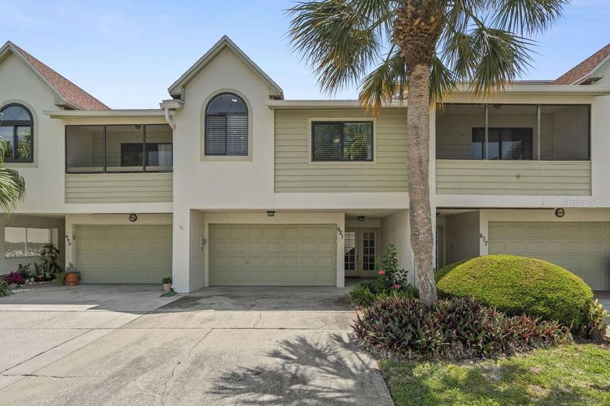 This incredible property is PERFECT for those seeking to be footsteps from an active & vibrant lifestyle. It is a tastefully updated townhome in a waterfront community, PLUS it comes with a deeded BOAT SLIP. Adjacent to the property is the 75-mile Pinellas Bike & Jogging trail, and less than a mile away is the recently updated Dunedin Golf Course and Clubhouse. A short bike ride north are the sandy beaches of the Dunedin Causeway & Honeymoon Island, and a short ride south are several parks, eateries, watering holes, and Historic Downtown Dunedin with its unique shops, top rated restaurants, and endless activities. Live where others vacation! Wake up early, grab your fishing rod and take a short boat ride to the Gulf of Mexico for a day of fishing & leisure, or grab some friends for a quick trip to Honeymoon, Caladesi, or Three Rooker Island to watch the sunset! The property itself is decorated in a beach cottage theme and features a covered front porch, plus relaxing 1st & 2nd floor screened porches overlooking open green spaces and majestic trees. It does not back up to other townhomes! Both porches are ideal for your morning coffee and evening glass of wine. Upon entering the home, a bright foyer and stairwell lead to the main floor where you're greeted by soaring ceilings and open living, dining, and kitchen spaces that radiate care and inspire entertaining. A wood burning fireplace gives the space a touch of nostalgia. The main floor was recently re-designed & renovated to include master AND guest suites, BOTH with private full baths... Plus a NEW half bath. The ground floor has a finished bonus room that can be used as a 3rd bedroom or family room, along with an oversized 2-car garage. The home also features the following updates, KITCHEN: shaker cabinets with hardware, granite counters, backsplash, stainless farm sink, faucet, and stainless steel appliances, MASTER & GUEST BATHS: vanities, stone counters, faucets, mirrors, showerheads, and custom tiled walk-in showers with benches & glass enclosures, INTERIOR: recessed lights, ceiling fans, light fixtures, 6-panel doors with hardware, and water heater (2020), EXTERIOR: shingle roof (2019), PLUS hurricane impact windows, doors, and glass sliders (2019). Curlew Landings is a beautifully maintained, pet friendly, waterfront community with heated pool & spa. Maintenance fees include almost everything but electric. At the community entrance, there’s a Jolley Trolley stop which runs from Clearwater Beach up to Tarpon Springs. Also enjoy the countless amenities Dunedin offers: beaches, parks, casual & fine dining, roof top bars, micro-breweries, cafes, bike riding, boating, fishing, downtown festivals, concerts, art shows, spring training baseball, championship golf, sunsets, and events at the Community & Fine Art Centers. PLEASE NOTE: This unit did NOT have any water intrusion during Helene & Milton! For those that may have interest, furniture is negotiable. This is a definite Must See for boating enthusiasts seeking an affordable, move-in ready home with an active & vibrant lifestyle this property conveys.