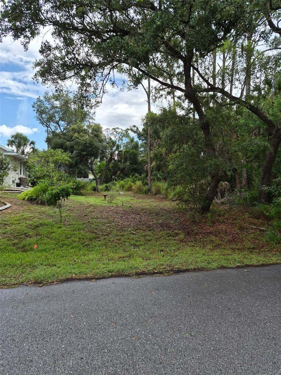 Photo of 13518 Ketridge Avenue, Port Charlotte, FL 33953 (MLS # TB8522600)