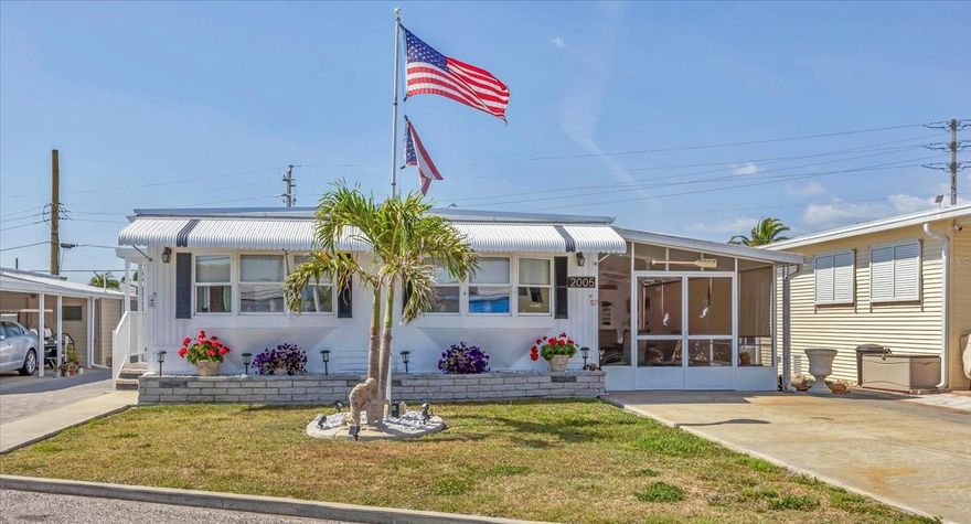 NEW PRICE! Immaculate, stunning and thoughtfully designed interior shines like new! It's the perfect blend of comfort and style in this two Bedroom, two Bath Double Wide Mobile Home in the highly desired, active 55+ Trailer Estates community. Bright, open Living and Dining areas. Kitchen is beautifully updated in a coastal feel with stainless steel appliances and quartz countertops. Generous Primary Bedroom includes an ensuite Bath. Convenient inside laundry closet. Luxury vinyl plank floors throughout. You can while away a peaceful afternoon on the 400 sq ft screened lanai listening to your rippling pond fountain just outside....or, there's plenty of room to host a friends and family BBQ. New roof 2024. 40 gallon water heater, 3 years old. Two sheds, 8x8 and 8x10. This home is well maintained inside and out.  You own the land. Boaters have direct access to Sarasota Bay from the Marina. Trailer Estates community offers so many options for a great day! Enjoy the large, heated community pool, hot tub, gym and wood shop. The community buzzes with pickleball, shuffleboard, kayaking, horseshoes, bocce, dancing and more. A US Post Office on site. 10 minutes to the SRQ Airport. Convenient to shopping, restaurants, the Arts and everything in Bradenton/Sarasota. Bring offers!