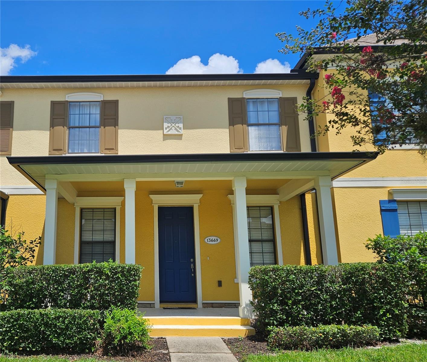 Impressive townhouse awaits you in the Chartres Garden Community in Hunter's Creek. This two story 3 bedrooms 2.5 bath shows like a model home. A large front porch welcomes you before entering the townhouse. When you step in, be amazed with the great room floor plan with arc column, travertine tiles flooring on the first floor, high ceilings with crown moldings, new interior paint, 42" white cabinets in the kitchen, breakfast bar, granite countertops with backsplash and stainless steel kitchen appliances. All wood floors on the second level including the stairs. Bathroom fixtures has been updated. Ceiling fans in the great room and all bedrooms. There is a courtyard between the townhouse and two car garage where you can entertain friends with an outdoor BBQ party. Community amenities include pool, playground, park, tennis courts, soccer fields, dog park and walking trails. HOA covers the roof and exterior/grounds maintenance. 2024 new roof. Location is close to perfect as just a mile away from restaurants shopping, grocery, schools and 417 Greenway. Pack your bags and move in.