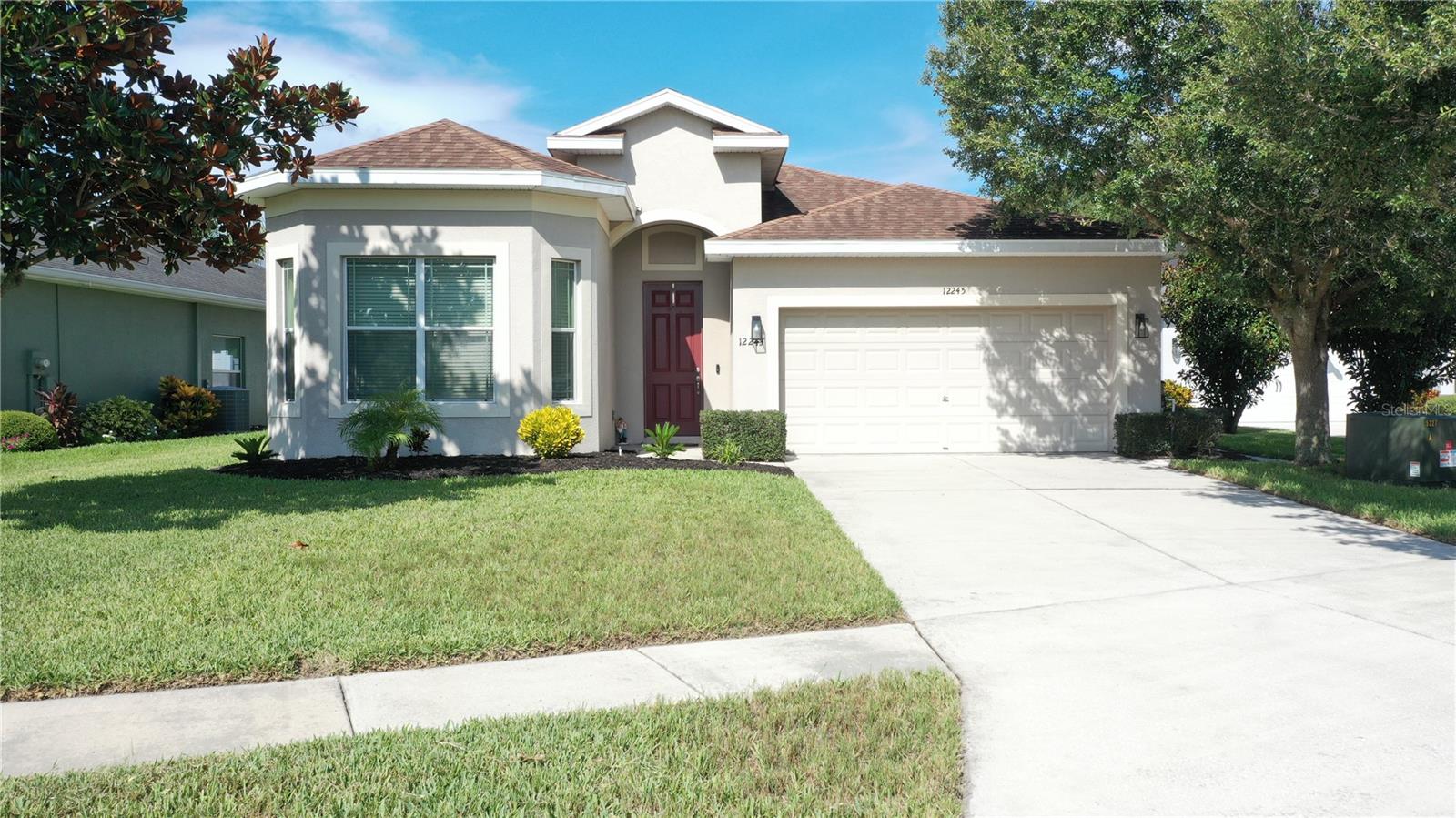 Come & get you some bright inspiring sunrises & beautifully hued sunsets on the lot you have been looking for. This Single Story Home on a Premium lot overlooking a pond, is ready & waiting for it's new owners. Starting from the curb appeal with its lengthy driveway to the size of the fully fenced in backyard, you can own your piece of Florida! The kitchen is accessible from both the living room & dining area for convenience & has granite counters, a new disposal, solid wood cabinets, a pantry & a breakfast bar. The living room has a tray ceiling, ceiling fan & a gorgeous view of the rear of the lot. All rooms throughout the house have a fan, as well as the rear lanai. The fully PVC fenced backyard has a wonderful fire-pit out back or you can enjoy the backyard from the covered & screened in rear Lanai. The Owner Retreat has access also directly to the rear lanai & features dual closets, a dual sink vanity, linen closet, walk-in shower, a garden tub & a large window for additional light. Bedrooms 2 & 3 are opposite from the owners Retreat & share a full bathroom located between the spare bedrooms. The interior laundry room features a washtub for convenience while providing direct access to the 2 Car garage. Located just minutes from the Veteran's Expressway, this 2014 built home offers 3 bedrooms, 2 baths, a 2 Car attached garage & 1,750 square foot of living enjoyment! This 2nd owner, well maintained home is a must visit so call to make an appointment today before someone beats you to it!