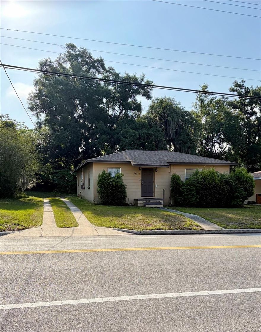 ATTENTION INVESTORS — this is the kind of property doesn’t  stay available long. Single-family residence with a tenant already in place, offering immediate income. New roof installed June 2021, major update already handled, reducing upfront capital needs. The interior features a practical and flexible layout with a front-facing living room, two bedrooms, and one full bathroom. A dedicated kitchen sits at the center of the home, along with an interior laundry room for added convenience. The home also includes a separate dining room plus an additional bonus room—perfect for a future media room, office space, or reconfiguration to maximize livability and rental appeal. Set on a large and flat lot, the property offers clear upside for exterior improvements, expansion potential, or enhanced tenant amenities. Central air conditioning is in place for year-round comfort. This is a straightforward investment with a tenant in place and clear upside potential—ideal for investors looking to secure a property they can improve over time and force appreciation. Opportunities like this don’t sit long in today’s market.
