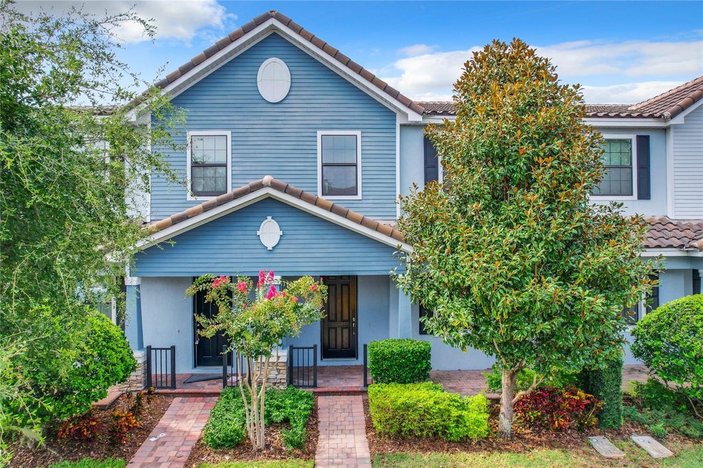 Photo of 10059 Eagle Creek Center Boulevard, Orlando, FL 32832 (MLS # O6441612)