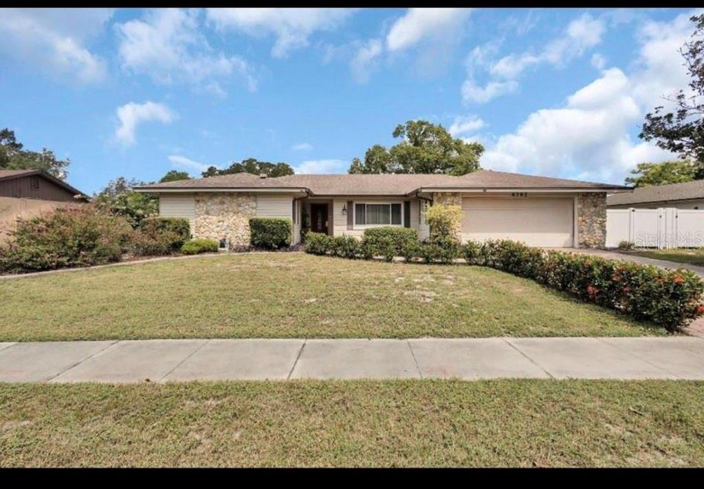 Photo of 6792 Tamarind Circle, Orlando, FL 32819 (MLS # O6404365)