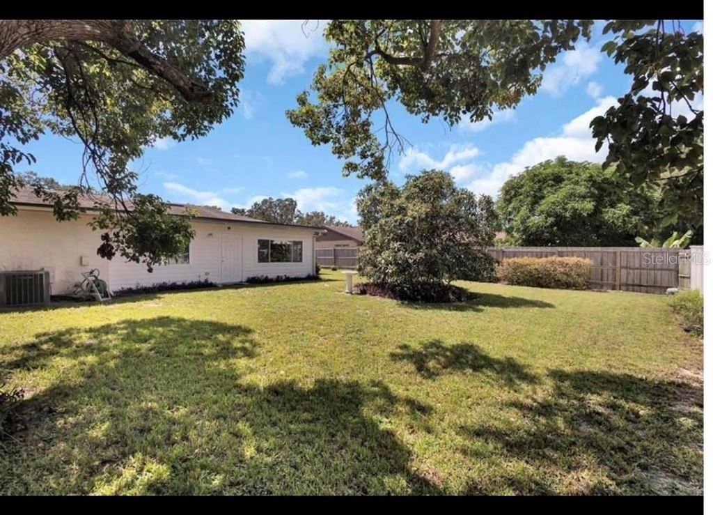 Photo of 6792 Tamarind Circle, Orlando, FL 32819 (MLS # O6404365)
