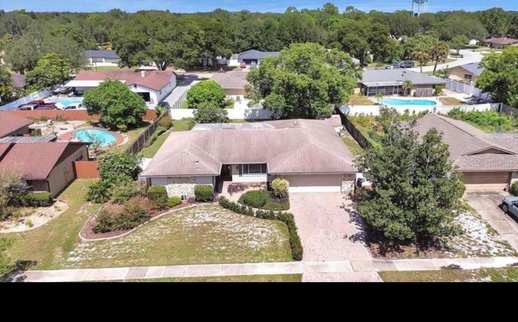 Photo of 6792 Tamarind Circle, Orlando, FL 32819 (MLS # O6404365)