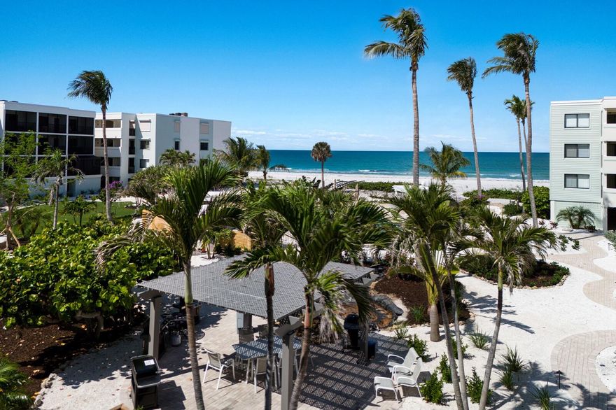 Step into a world of coastal elegance and comfort on Boca Grande’s most coveted stretch of beach. This beautifully appointed 2-bedroom, 
2-bath corner condominium is nestled within a pristine, gated community—offering both privacy and a sense of belonging.
From the moment you enter, you’ll be captivated by the serene views through lush tropical courtyards out to the Gulf, setting a tranquil backdrop for daily living. As a corner residence, the home is bathed in natural sunlight, with extra windows brightening the kitchen and master suite—creating an airy, uplifting atmosphere.
The expansive floor plan flows effortlessly, featuring spacious living areas that invite you to unwind or entertain in style. Enjoy your morning coffee or evening gatherings at the charming breakfast bar, which seamlessly connects the dining area to the heart of the home.
One of the property’s most enchanting features is its double screened lanai design—offering two generous outdoor living spaces. Here, you can savor gentle Gulf breezes, bask in quiet mornings, or host friends against a backdrop of swaying palms and tranquil sea air.
Practicality meets luxury with first-floor access above secure under-building parking and a private storage closet—perfect for your beach gear or personal treasures. The building’s crisp white exterior, accented by bluish-green HardiePlank siding, highlights its timeless coastal appeal.
Step outside to discover a resort-style courtyard: unwind by the heated swimming pool and spa, soak up the sun on the expanded deck, or enjoy al fresco dining in one of two BBQ areas. For the active at heart, upgraded tennis courts and convenient elevators add to your ease and enjoyment. Dedicated on-site management ensures peace of mind and a seamless living experience.
Just moments away, explore world-class fishing, golf, boutique shopping, and Boca Grande’s celebrated dining—all at your fingertips.
Experience the lifestyle you deserve in this exceptional Gulf-front retreat—where every day feels like a getaway. Schedule your private tour today and discover the warmth, beauty, and exclusivity that await you!