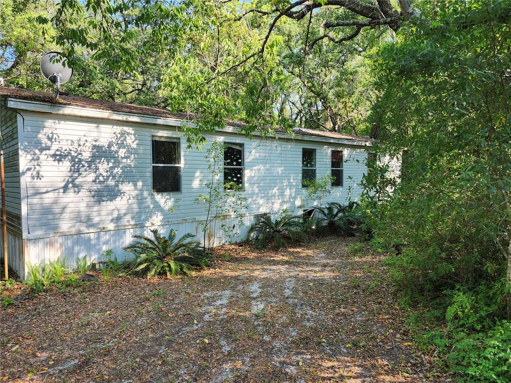 Photo of 17751 Akins Drive, Spring Hill, FL 34610 (MLS # W7864621)