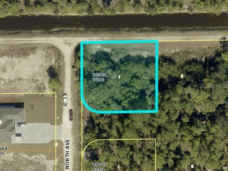 Photo of Pid 10386895, Lehigh Acres, FL 33972 (MLS # TB8556469)
