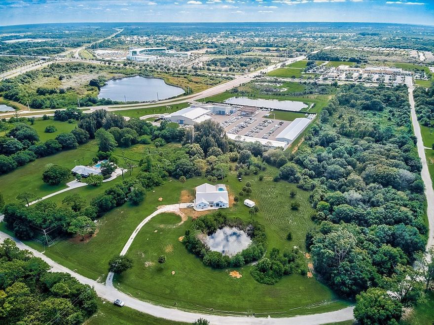 Awesome development opportunity on 5.54 acres close to the new Sarasota Memorial Hospital, as well as Publix shopping plaza, restaurants, Nokomis Orange Groves and so much more nearby. ONLY 4.5 miles to Nokomis Beach, 6.6 miles to Venice Beach and 15 miles to Siesta Key Beach.
Assemblage available for up to 16.68 acres with 5.91 Acres ( 1109 Twin Laurel Blvd / MLS ID N6133285 ) and 5.23 acres ( 1107 Twin Laurel Blvd / MLS ID N6133298 )

Area Growth & Development Momentum

The subject property is positioned within one of the fastest-growing corridors in South Sarasota County, surrounded by substantial planned and recently delivered development that continues to transform the Laurel Road / I-75 area into a true mixed-use destination.

Immediately east of the site, a major master-planned mixed-use project is advancing on approximately 32 acres. This development is expected to introduce a full spectrum of uses including hospitality, office, retail, residential, assisted living, and self-storage—bringing new population density, employment, and daily traffic to the immediate area.

To the west, Casatta Lakes is delivering a 151-home luxury residential community, with custom new construction homes commanding prices well above $700,000. This high-income residential base strengthens long-term demand for retail, medical, service, and lifestyle-oriented uses nearby.

Southwest of the property, a large-scale commercial mixed-use project is planned along Laurel Road, anchored by national big-box retailers including Walmart and Home Depot. This development will further solidify Laurel Road as a primary retail and commercial spine serving both local residents and regional traffic.

The area is also anchored by Sarasota Memorial Hospital, which has already completed a significant expansion and continues to invest heavily in the surrounding medical district. Current plans include a new state-of-the-art Rehabilitation Pavilion, reinforcing the corridor’s role as a regional healthcare hub and driving sustained demand for medical office, outpatient, hospitality, and supporting commercial uses.