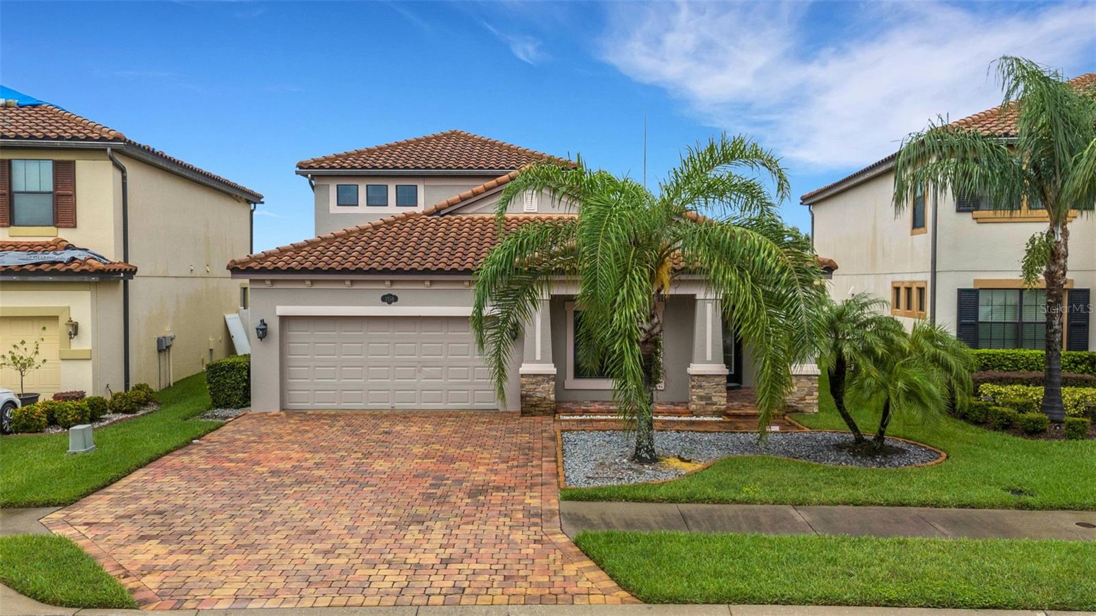 NOW AVAILABLE FOR RENT . . . . This stunning home has room for the entire family with 4 bedrooms, 3 bathrooms, study, and a game room (or optional 5th bedroom) The open-concept floor plan has elegant porcelain tile throughout the common areas and primary bedroom. The kitchen showcases white cabinetry, quartz countertops, a stylish tile backsplash, and stainless-steel appliances. The spacious primary suite includes a walk-in California closet system and a remodeled ensuite bathroom. The versatile bonus/game room is equipped with a closet and could easily be utilized as a 5th bedroom. Additional highlights include an electric fireplace with a stone accent wall, crown molding, custom window shades, a spacious study / home office, solid surface flooring throughout, a screened lanai and fresh paint throughout. The gated community of TerraLargo offers a resort-style pool, clubhouse, fitness center, playground, tennis, pickleball, and basketball courts. Located just minutes from I-4, shopping, dining and more.