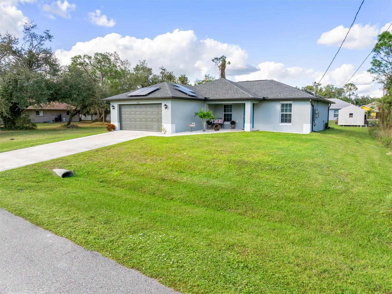 MOVE-IN READY | SOLAR-POWERED | ENERGY-EFFICIENT | NORTH PORT, FL HOME
HUGE PRICE REDUCTION – MOTIVATED SELLER!
Welcome to your dream home in North Port, Florida! Built in 2020, this beautiful 3-bedroom, 2-bathroom single-family residence is packed with upgrades and powered by fully-owned solar panels—not leased—with a transferable warranty. Enjoy ultra-low electric bills (only $67 at the highest during peak summer!) and say goodbye to water bills thanks to a private well system.
This energy-efficient smart home offers an open-concept layout perfect for modern living. The spacious great room seamlessly connects the living, dining, and kitchen areas—ideal for entertaining or relaxing. The upgraded kitchen includes soft-close cabinets, stainless steel appliances, a custom tile backsplash, breakfast bar, and plenty of counter and storage space.
The luxurious master suite features a walk-in closet, an en-suite bath with a glass-enclosed walk-in shower, and modern finishes. A split bedroom floor plan offers privacy with two additional bedrooms—perfect for guests, a home office, or growing families. The second full bath features a stylish glass-enclosed tub/shower combo.
Step outside to the screened lanai, where there’s plenty of space for outdoor seating and a future pool if desired. This home sits in an X flood zone, meaning no flood insurance required, and there’s no HOA to worry about.
Additional features include:
KINETICO Reverse Osmosis System in the kitchen
Whole-House Water Softener System
Irrigation System for lush landscaping
Energy-Efficient Hurricane Impact Windows & Storm Shutters
2-Car Garage with custom built-in cabinetry for extra storage
Pet-Friendly, safe, and quiet neighborhood
Located just minutes from I-75, schools, shopping, dining, parks, and the Atlanta Braves Spring Training Stadium, with easy access to world-class Gulf Coast beaches, nature preserves, and golf courses.
Why wait on new construction? This home is lightly lived-in, upgraded, and 100% move-in ready. Perfect for first-time buyers, retirees, snowbirds, or anyone looking for a smart investment in sunny Southwest Florida.
Schedule your private tour today and experience the comfort, savings, and style of solar-powered living in North Port!