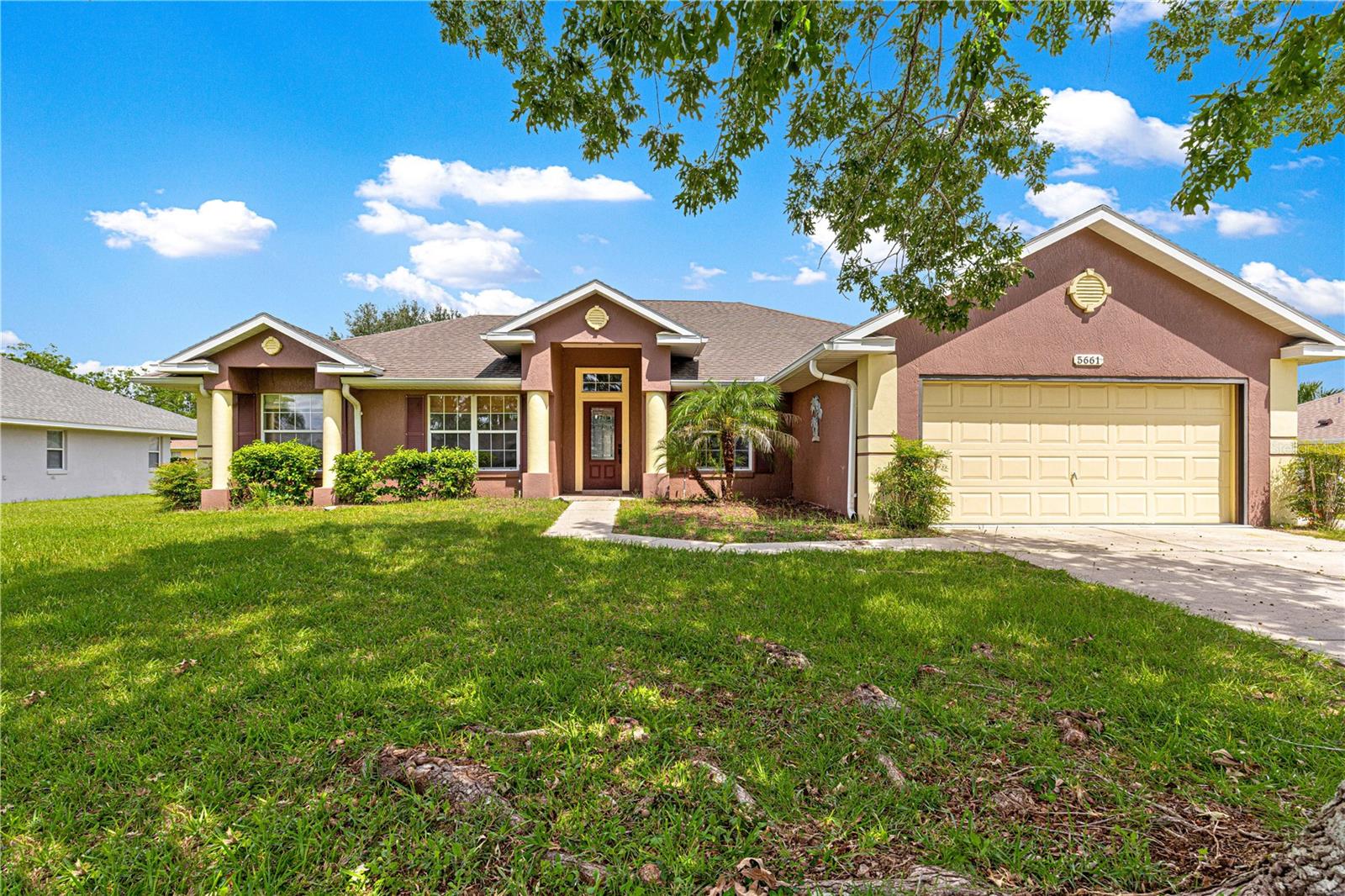 Spacious 3-bedroom home with office & screened porch in prime location! Welcome to this beautifully maintained 3-bedroom, 2-bathroom home with a dedicated office/den, offering over 1,800 square feet of comfortable living space in a desirable, deed-restricted, family-friendly community. Step inside to find soaring cathedral ceilings, decorative plant shelves, and a spacious split floor plan featuring an expansive great room which opens to a formal dining area and a well-appointed kitchen featuring granite countertops, stainless steel appliances, and a cozy breakfast nook. The private master suite has a large walk-in closet, luxurious soaking tub, walk-in tiled shower, and dual sink vanity. Two additional guest bedrooms are tucked away on the opposite side of the home along with a full guest bathroom. Enjoy the convenience of an inside laundry room and relax year-round on the huge screen-enclosed porch that opens to a paved patio and a generously sized backyard—perfect for entertaining or quiet evenings at home. Located near schools, shopping, dining, and entertainment, this home combines comfort, convenience, and community in one perfect package.