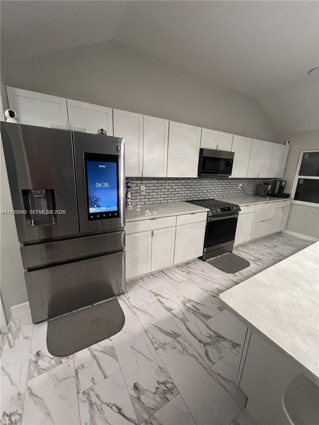 Photo of 310 S 3rd Street, Haines City, FL 33844 (MLS # S5147243)