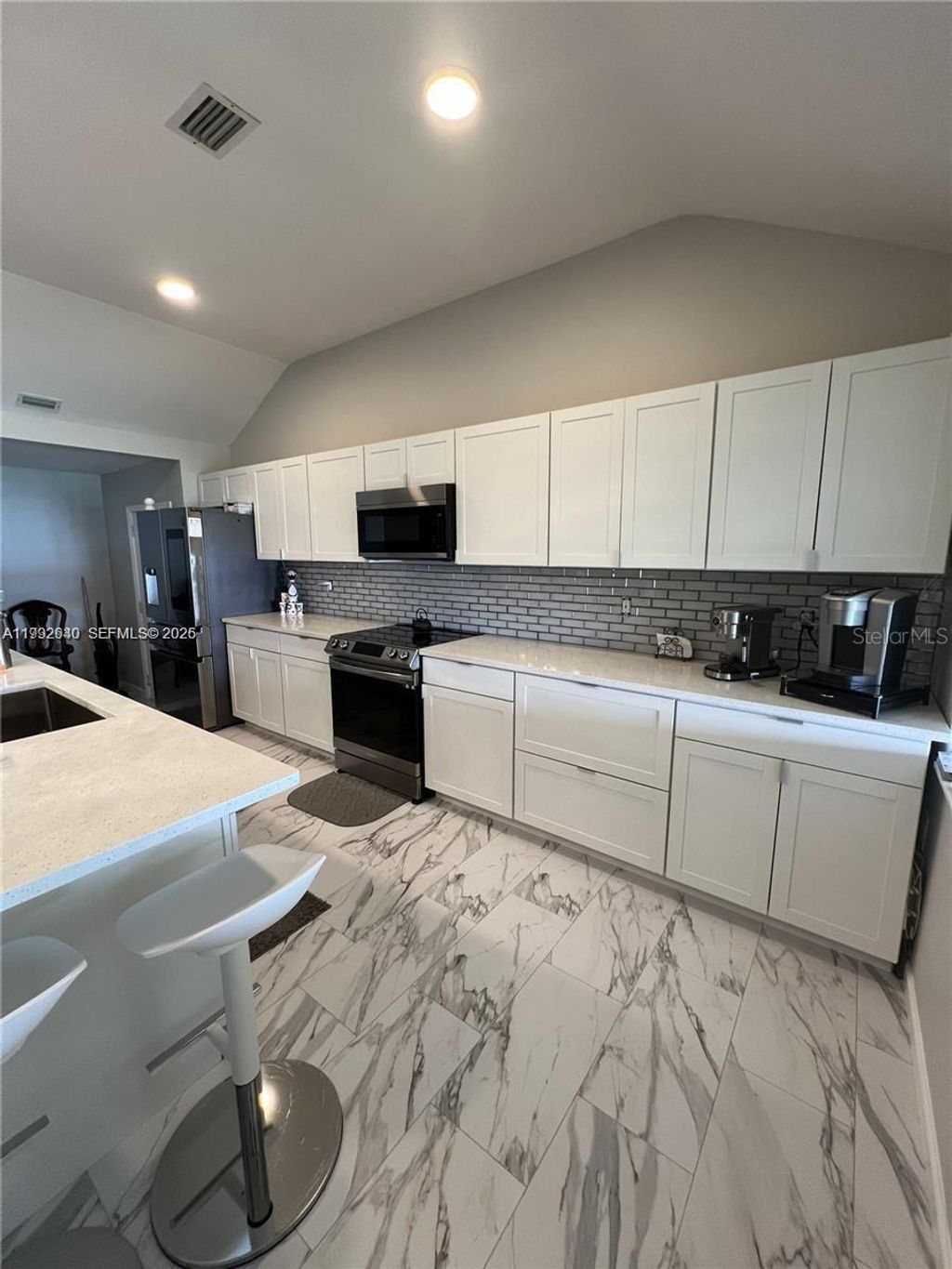 Photo of 310 S 3rd Street, Haines City, FL 33844 (MLS # S5147243)