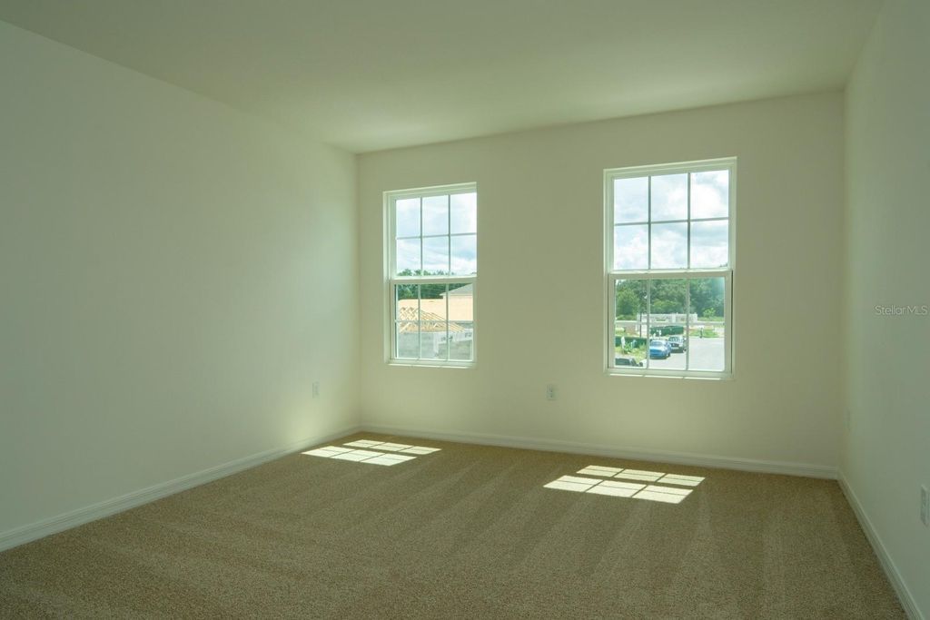 Photo of 1673 Swan Swim Drive, Davenport, FL 33837 (MLS # O6409103)
