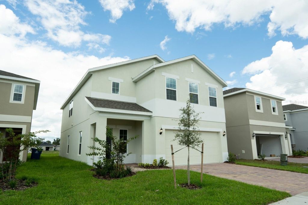 Photo of 1673 Swan Swim Drive, Davenport, FL 33837 (MLS # O6409103)