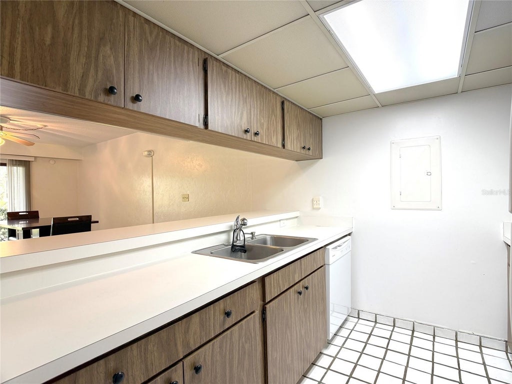 Photo of 3033 Camelot Drive #303, Haines City, FL 33844 (MLS # O6439008)