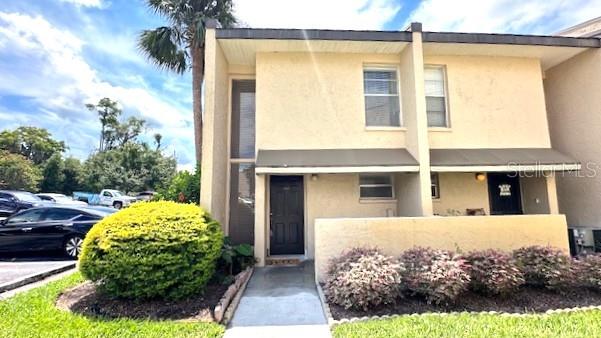 Total Remodel with NEW KITCHEN, PAINT, FLOORING, BATHS, LIGHT FIXTURES, DOOR HANDLES, ALL BLINDS. MICROWAVE AND STOVE ARE REGULAR SIZED. BEDROOMS ARE UPSTAIRS AND SHARE ONE BATHROOM. SHOWER IN BRAND NEW, ZERO CARPETS, ALL LAMINATE WITH NEW TILE FLOORS IN KITCHEN, BATHS, BOTH PORCHES. THERE IS A FULL SIZE WASHER DRYER LOCATED IN CLOSET OFF OF THE REAR DOWNSTAIRS PORCH. THIS UNIT IS A MUST SEE AND FEELS LIKE NEW. QUALIFIED APPLICANTS ONLY. NON SMOKING UNIT.