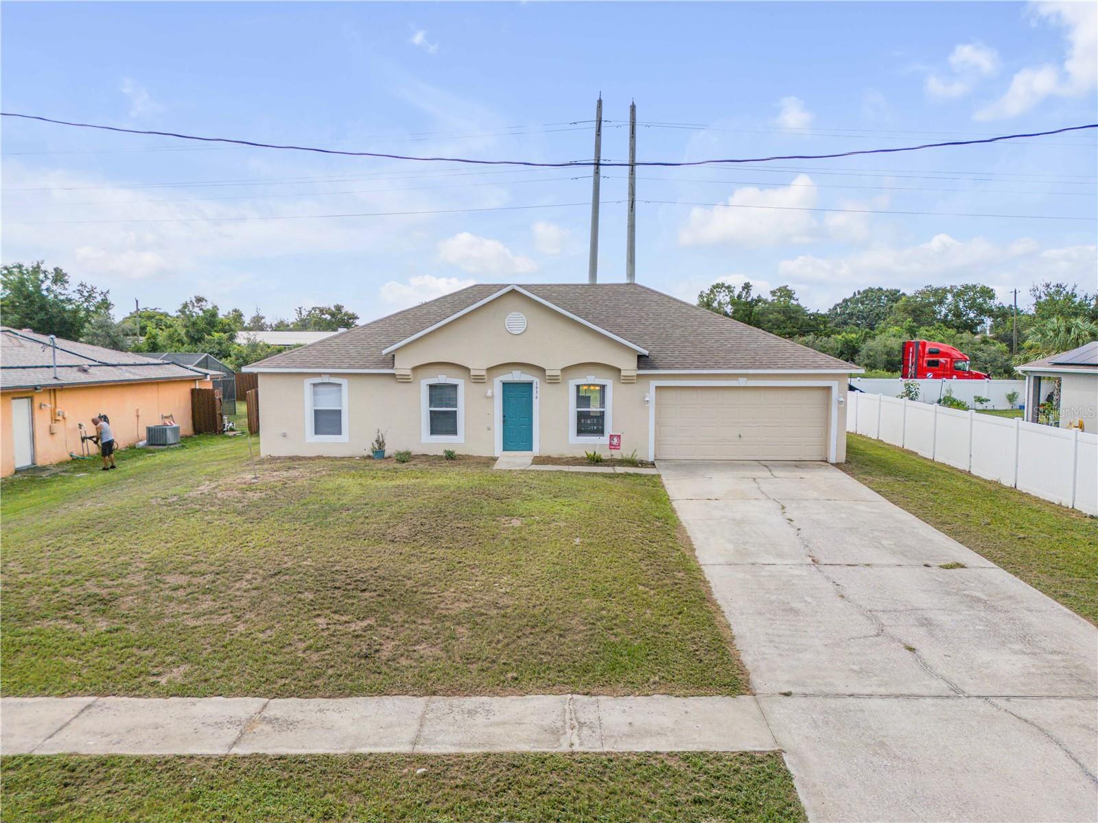 Contemporary home in great condition on a high and dry oversized lot backing up to a 300 foot easement for additional space and privacy. Great split bedroom floorplan with a large eat-in kitchen with a quartz countertops, tile backsplash, new stainless steel appliances, a big pantry, and a long breakfast bar overlooking the spacious family room. There is also a separate living room, formal dining room, inside laundry, and a 300 sf patio off the rear of the house with great views of the huge backyard. Upgrades include a new AC system, wood laminate flooring throughout all the main living areas, and the roof was replaced in 2017. All this is ready for immediate occupancy and only minutes to I-4, the Orlando Metro Area, and the beaches!