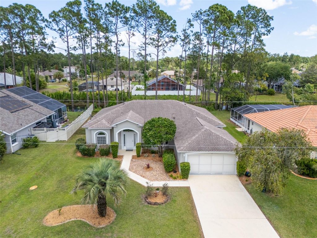 Photo of 11 Edgewater Drive, Palm Coast, FL 32164 (MLS # FC318079)