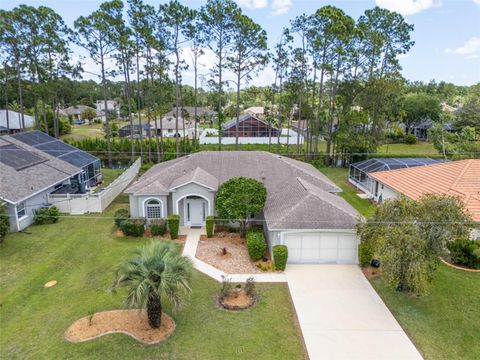 Photo of 11 Edgewater Drive, Palm Coast, FL 32164 (MLS # FC318079)