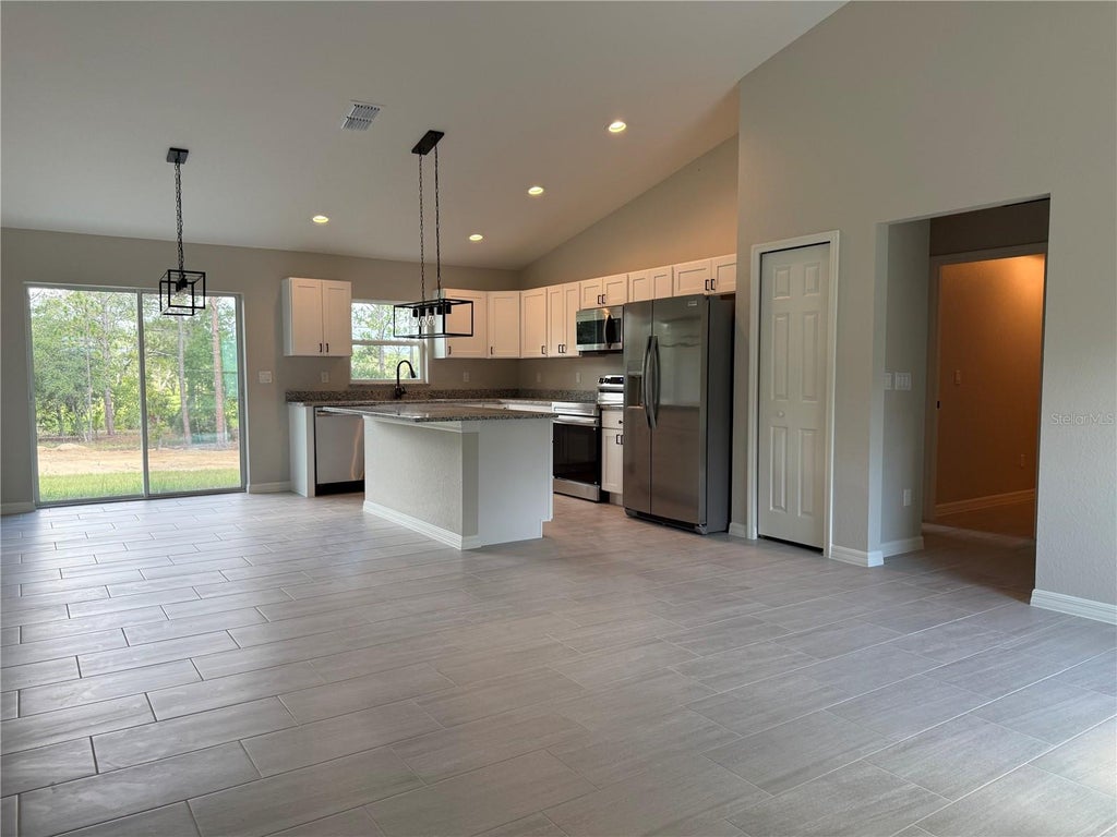 Photo of 75 Locust Drive, Ocala, FL 34472 (MLS # OM733104)