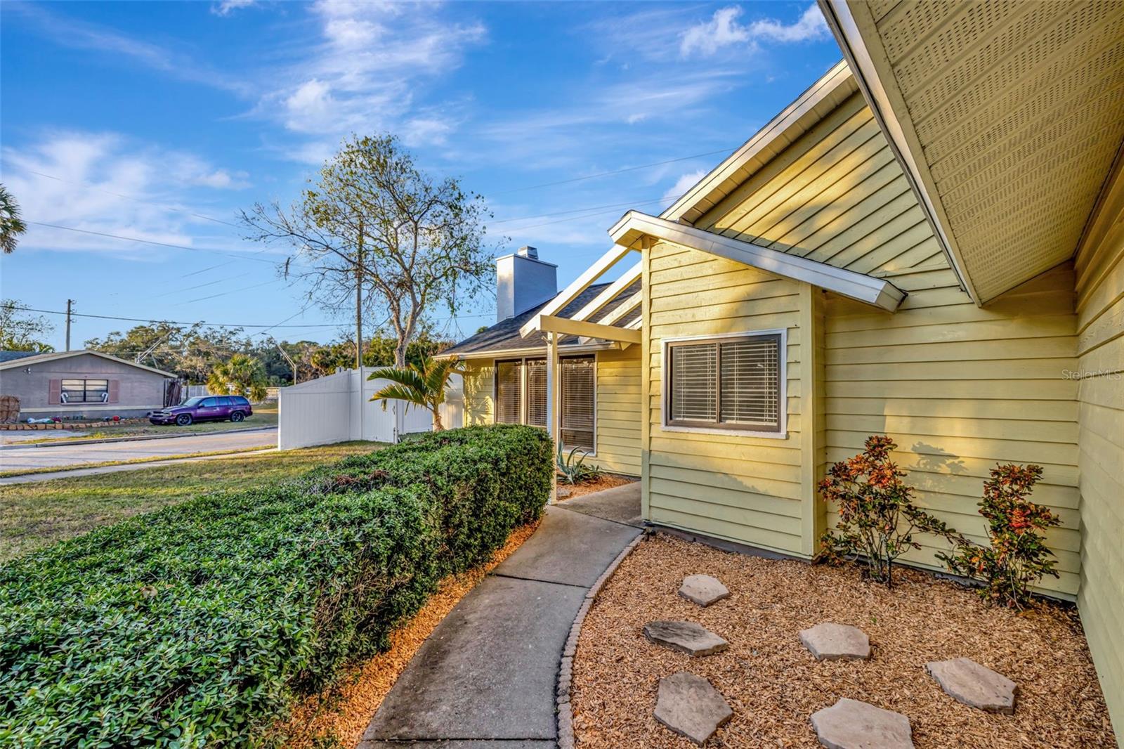 PRICE IMPROVED! Motivated Seller! Welcome to this move-in ready beautifully updated and spacious 3-bedroom, 2-bath home in a prime Sarasota location, offering approximately 1,831 sq. ft. of living space, plus multiple flexible rooms that can be tailored to your needs. Situated on a large corner lot with nearly a quarter-acre of land, there’s ample space for outdoor fun, RV parking / boat parking, or playing with your furry friends. The long driveway adds even more convenience and curb appeal.
Notable Updates & Features Include:
2024 roof, newer electrical box, and AC system for the den/office room;
Luxury vinyl plank flooring in bedrooms and living room, and tiled throughout (no carpet!);
Updated lighting fixtures, including recessed lighting;
New 6-ft vinyl privacy fence for ultimate backyard seclusion;
New Epoxy flooring in the spacious 2-car garage with 2nd fridge;
Freshly painted interiors and new stucco chimney exterior.
Other newer updates include 2019 water heater and 2017 garage door. Plus water softener system and exterior security cameras.
As you enter, you’ll be immediately impressed by the high vaulted 9-ft ceilings and an abundance of natural light that fills the open-concept living and dining area. The stunning wood-burning stone fireplace adds warmth and character, making it the perfect spot for cozy evenings. Adjacent is the versatile den/office.
The galley kitchen is a chef’s dream, featuring stainless steel appliances, granite countertops, soft close drawers and ample cabinet space. This leads you right into an eat-in space/ dinette with high ceilings and clerestory windows that fills the space with even more light, creating the perfect setting for entertaining or morning coffee.
Need more space? The home includes a flex room / Florida room that can be adapted to whatever suits you best — a playroom, a gym, or an additional lounge area.
The primary bedroom is a serene retreat, offering high ceilings, a beautiful ensuite bathroom with a large dual-head shower, and a spacious walk-in closet. The two additional guest bedrooms are bright and airy with generous closet space and easy access to the guest bathroom.
For added convenience, the garage is outfitted with extra cabinetry, a washer, dryer, utility sink, and even an extra fridge — making laundry day and home organization a breeze.
Step outside and enjoy the natural Florida landscaping in the front yard or unwind in the fully concrete and newer vinyl fenced-in private backyard, making perfect for BBQs, gardening, or just unwinding after a long day. In addition to that the home comes with security system and exterior cameras.
Additional Perks: There's No HOA and No CDD. Home is centrally located near shopping, top-rated schools, restaurants, hospitals, downtown Sarasota, beaches, golf, essential amenities, and easy access to highways. This home had no water/flood intrusion during the storms.
This is your chance to own a stunning home in a highly sought-after area, with nothing left to do but move in! Good for your own residence, temporary rental while you build, or income producing rental. Don’t miss out on this gem — schedule a showing today and make this your new home to kick off the new year in style!