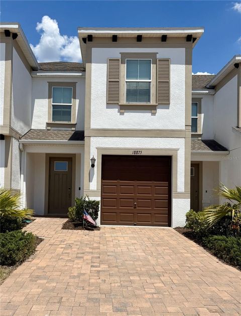 Photo of 18875 Noble Caspian Drive, Lutz, FL 33558 (MLS # O6311729)