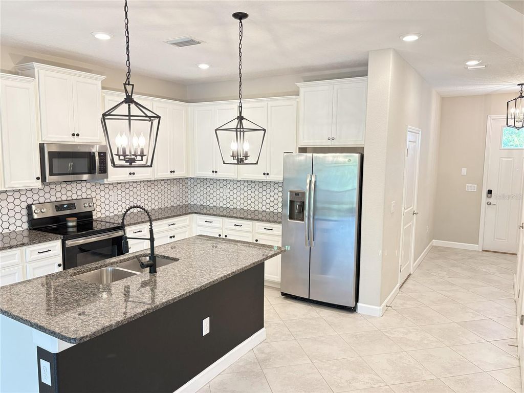 Photo of 18875 Noble Caspian Drive, Lutz, FL 33558 (MLS # O6311729)