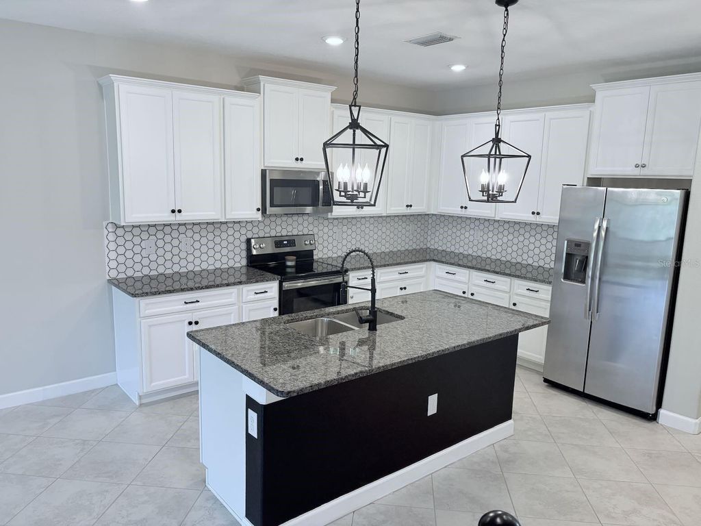 Photo of 18875 Noble Caspian Drive, Lutz, FL 33558 (MLS # O6311729)