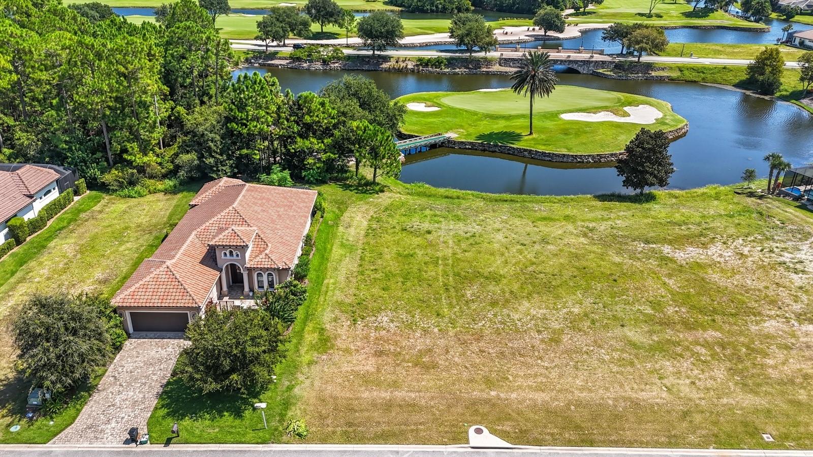 Build your dream home in the esteemed Conservatory at Hammock Beach, one of Palm Coast’s most sought-after gated golf course communities. This 50x150 homesite offers an incredible rear view overlooking the iconic 8th hole island green of the award-winning Tom Watson–designed golf course. With plenty of room to design a custom residence, you’ll enjoy both privacy and panoramic golf vistas. With optional membership in the Hammock Beach Club, you will enjoy The Conservatory's featured first-class amenities including a stunning clubhouse, fitness center, resort-style pool, and full access to Hammock Beach Resort offering oceanfront golf, dining, and spa experiences. Conveniently located near beaches, shopping, dining, and I-95 for easy access to St. Augustine and Daytona. Don’t miss this opportunity to own one of the most desirable golf view lots in the community!